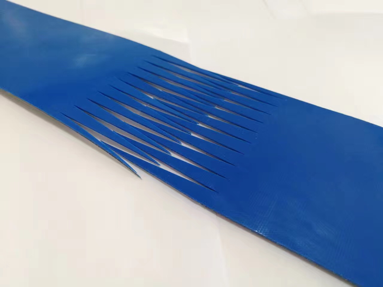 打孔皮帶